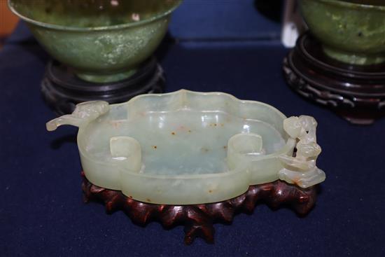 A Chinese bowenite jade brushwasher and a pair of hardstone bowls